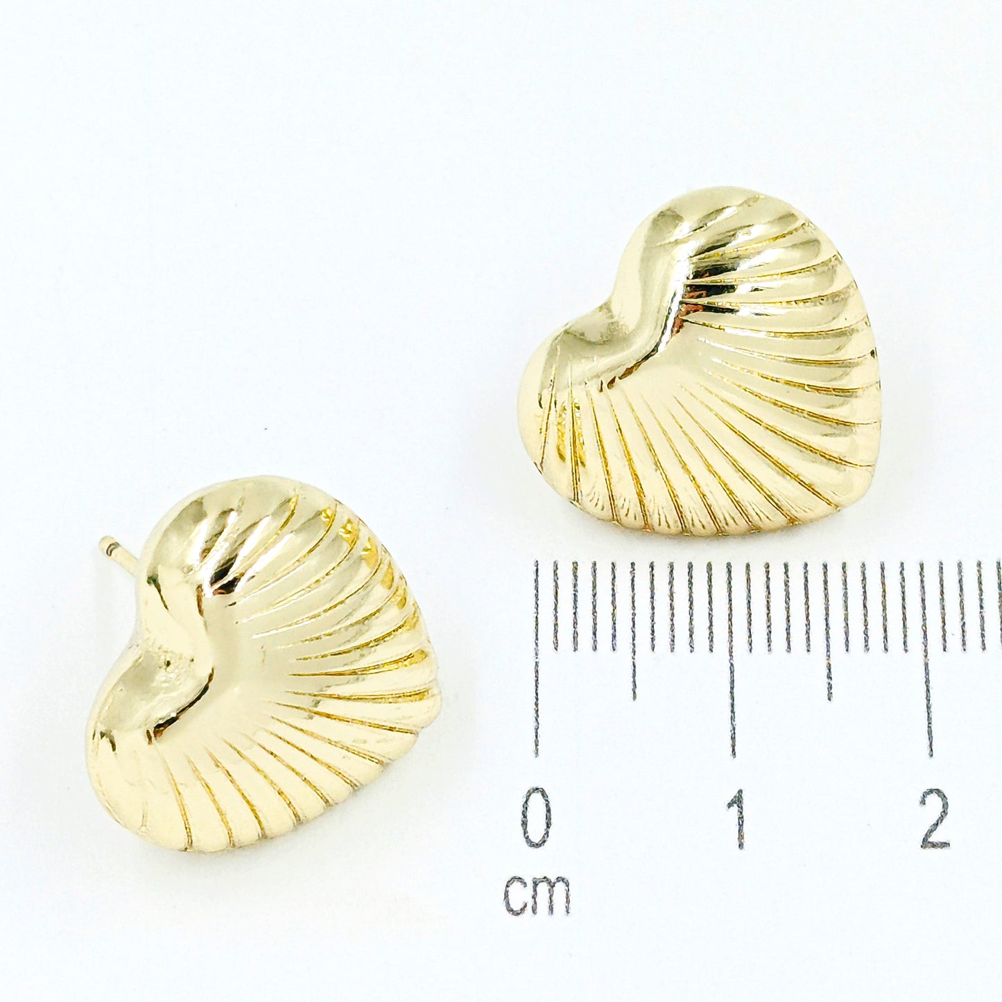 Arete corazon tallado