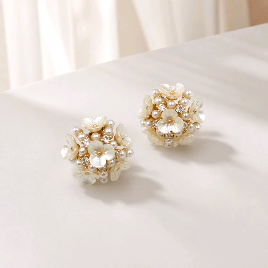 Arete flores perlas