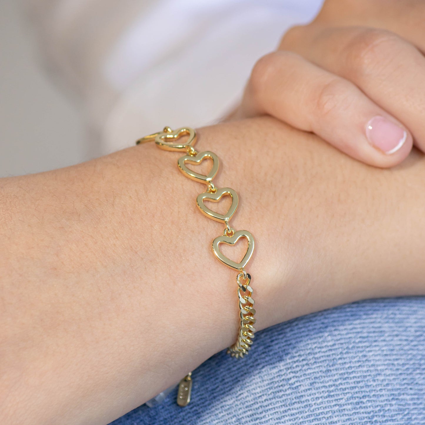 Pulsera silueta corazones