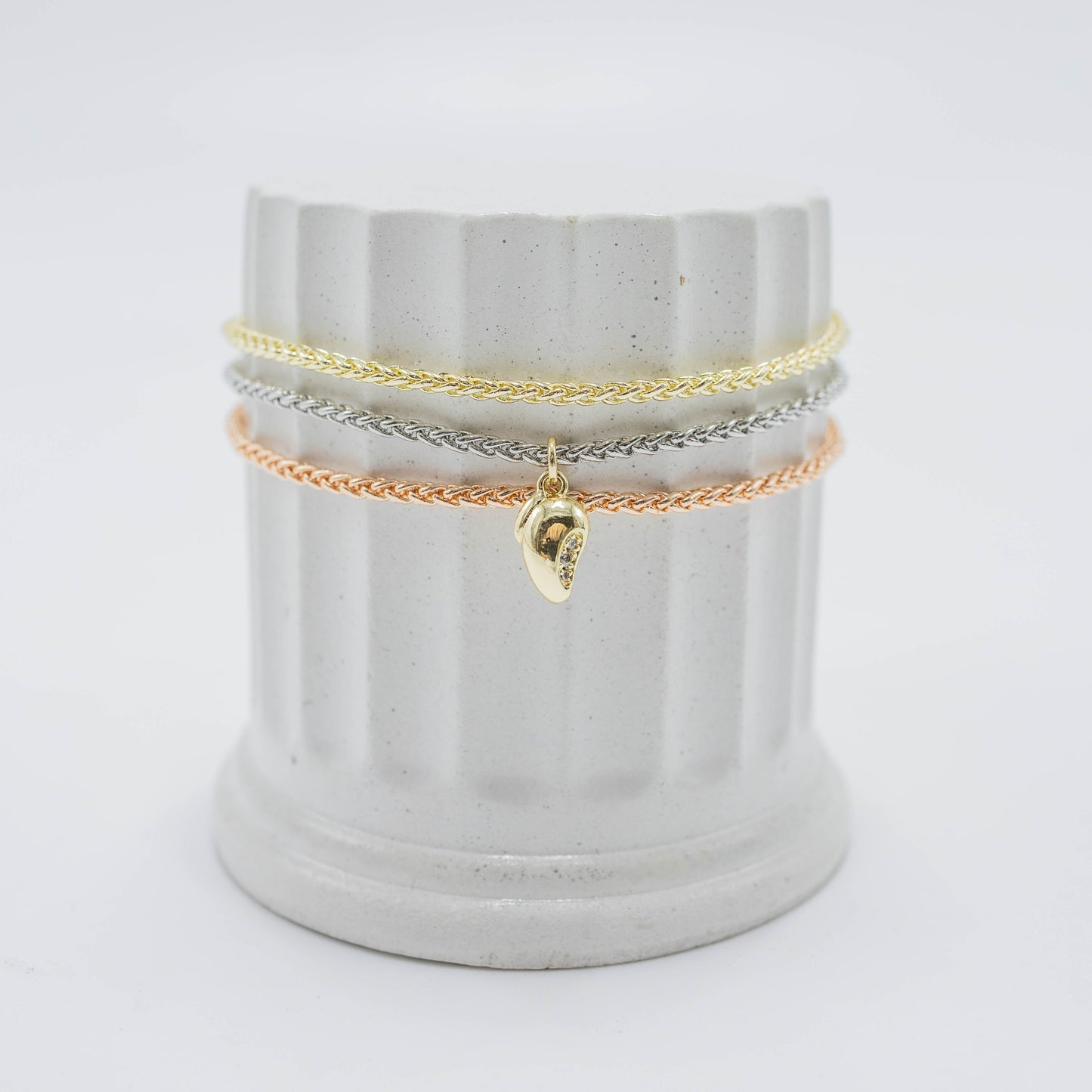 Pulsera laso tres oros