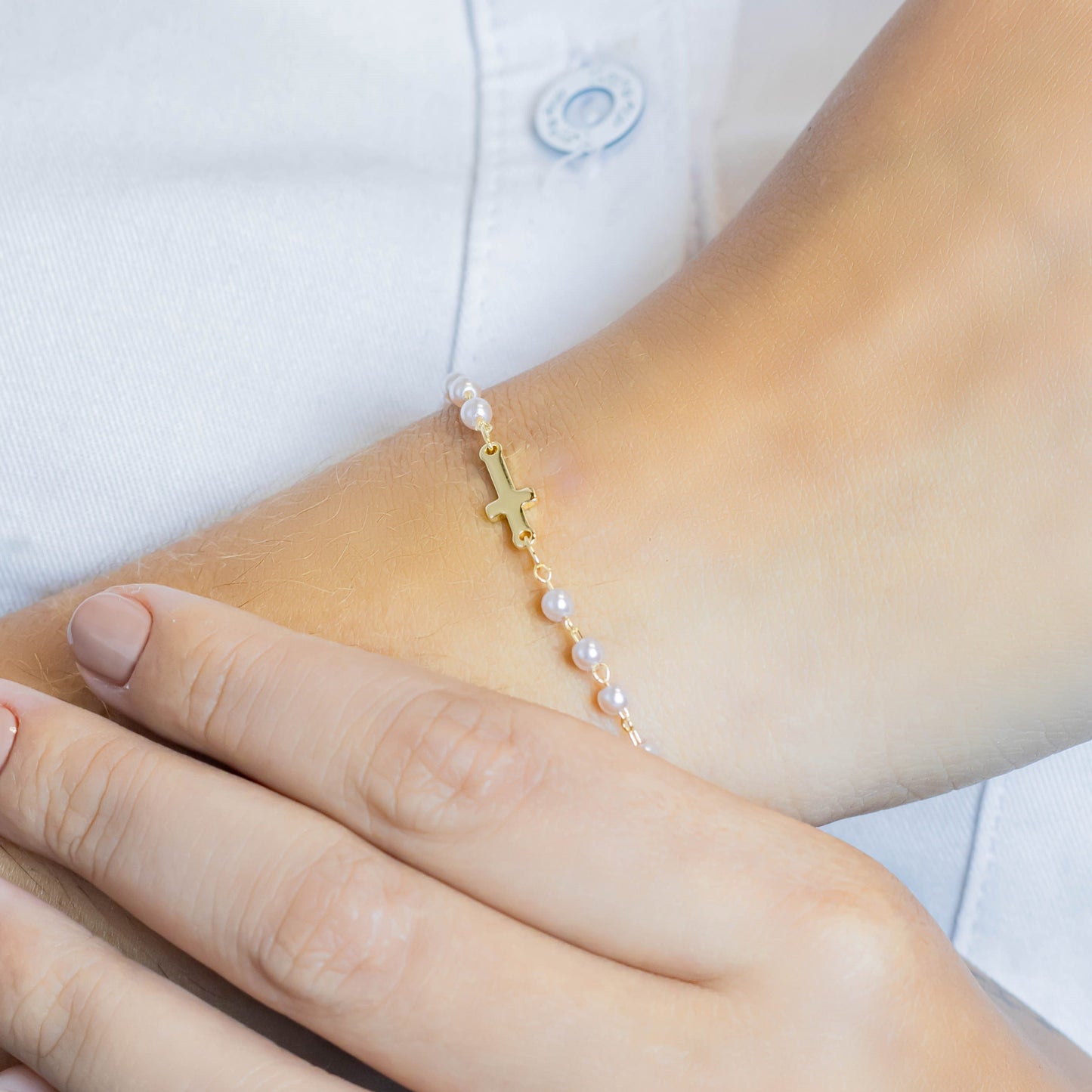 Pulsera cruz perla