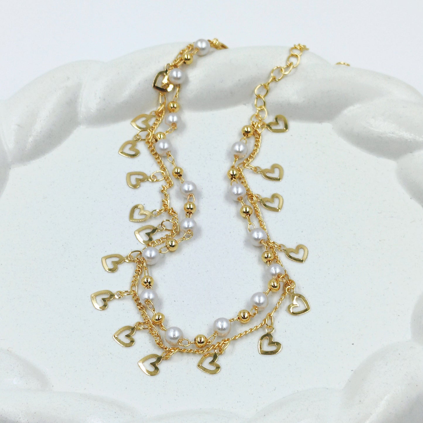 Tobillera doble perla corazones