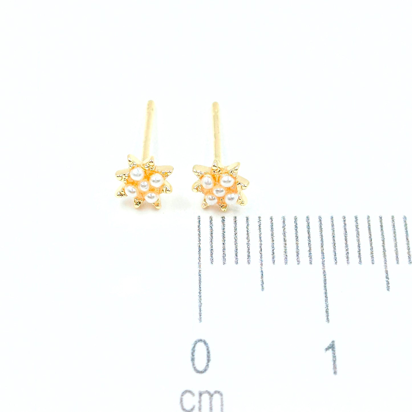 Topo estrella perla