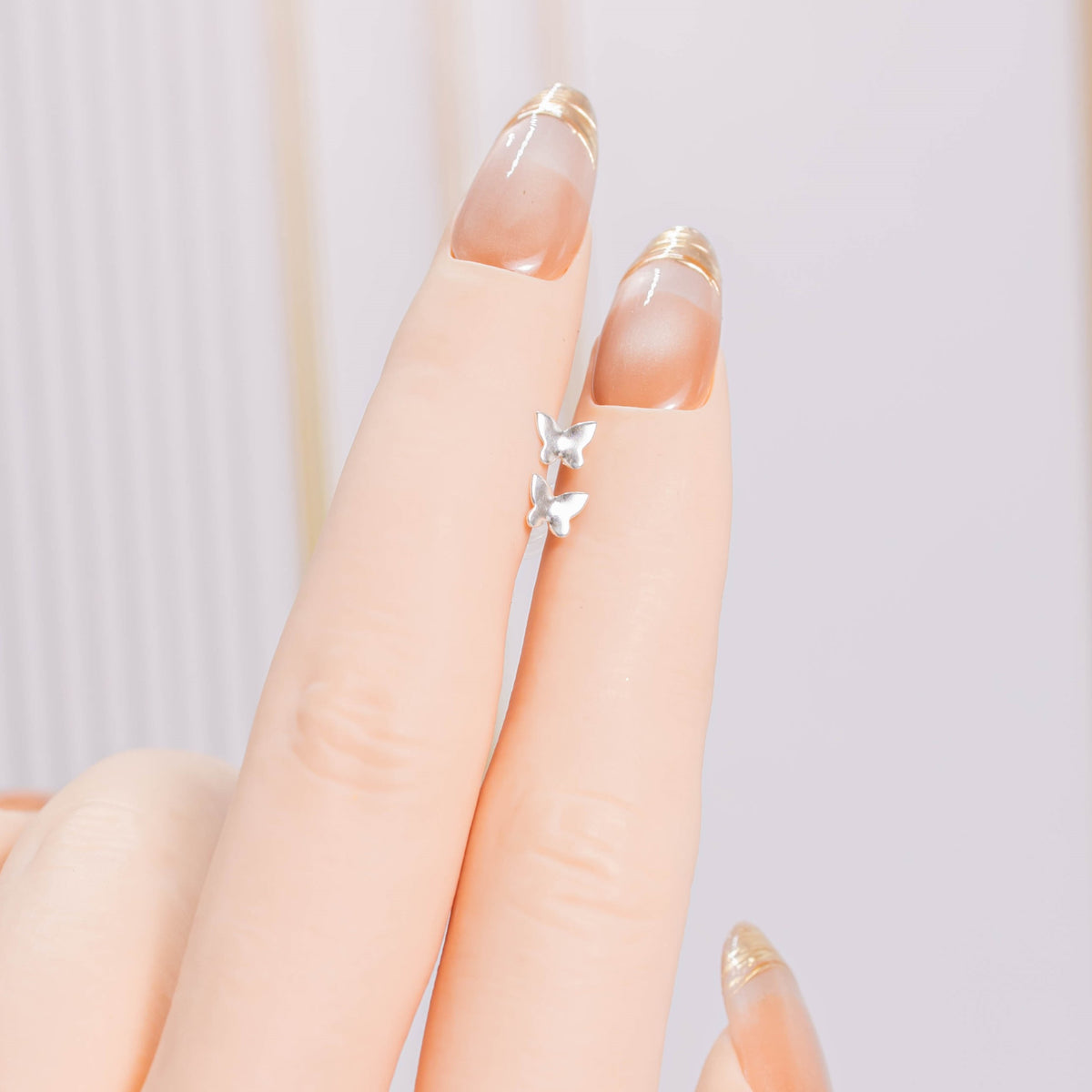Topo plata mariposa