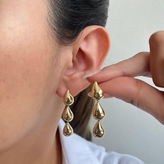 Arete gotas dijes  Amulí