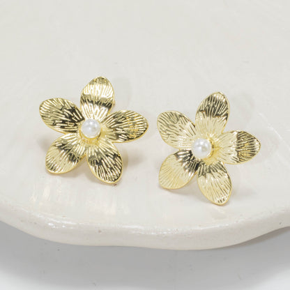 Arete flor perla