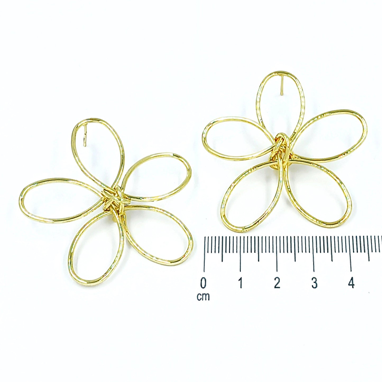 Arete silueta flor