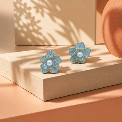 Arete flor azul