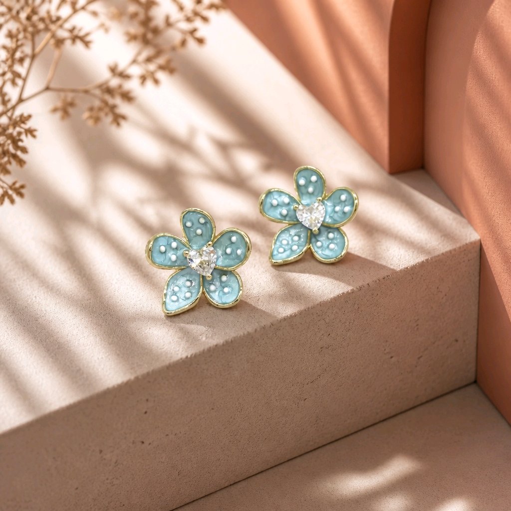 Arete flor azul puntos