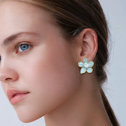 Arete flor azul puntos