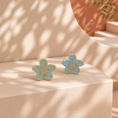 Arete flor puntos azul