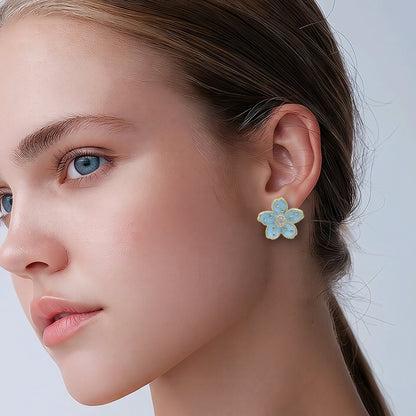 Arete flor puntos azul
