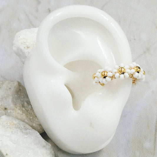 Earcuff bronce flor blanco Amulí