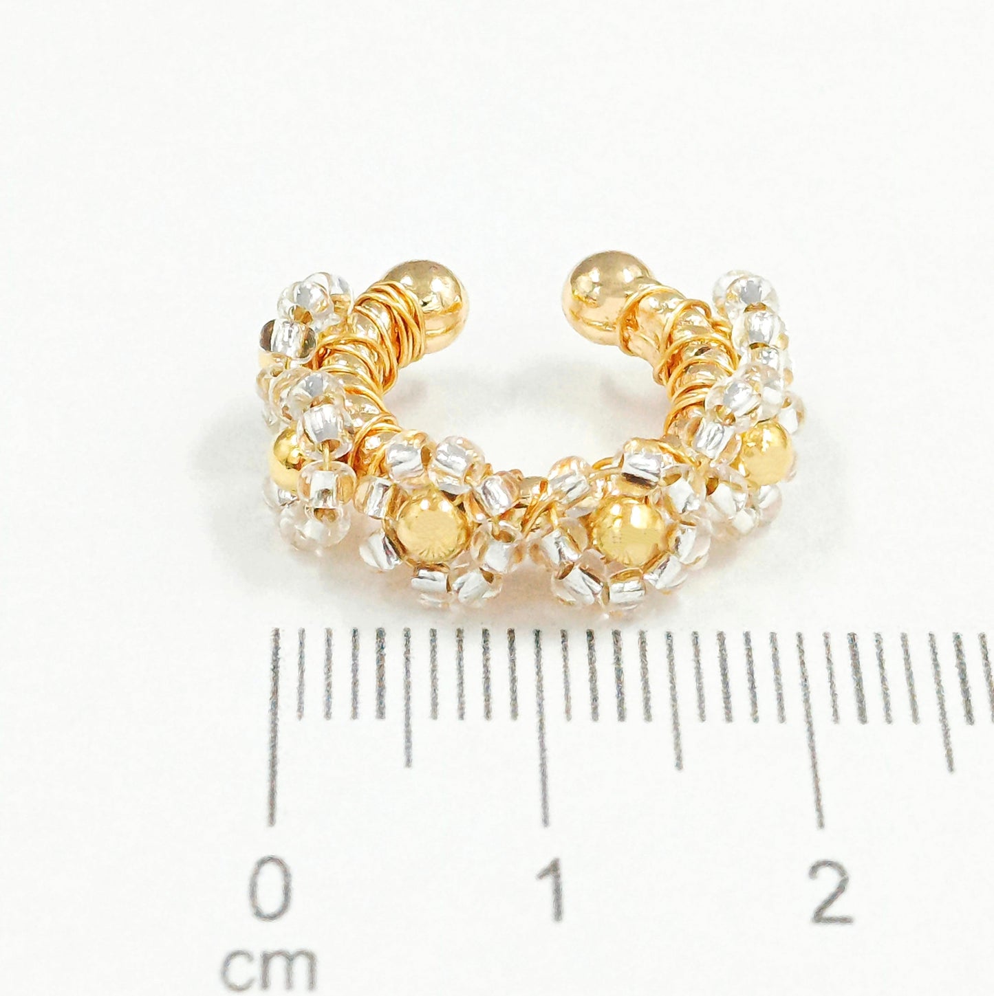 Earcuff bronce flor cristal