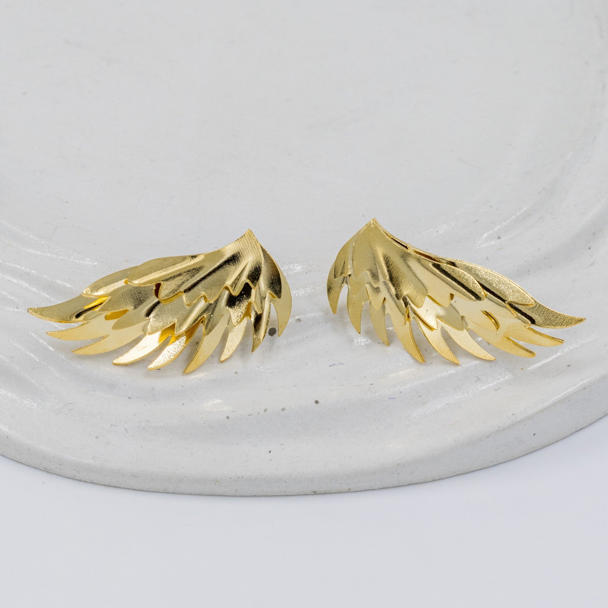 Arete bronce alas lisa 3cmAmulí