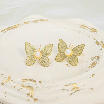 Arete bronce mariposa perla