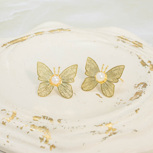 Arete bronce mariposa perla