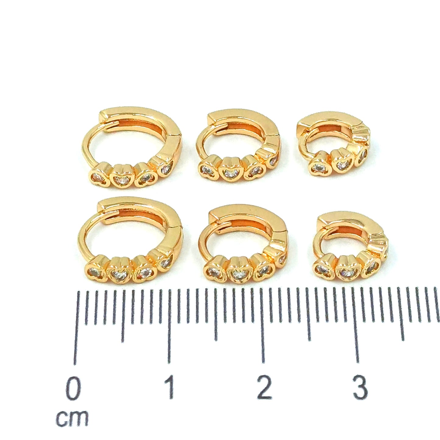 Orejera trío corazón zircones