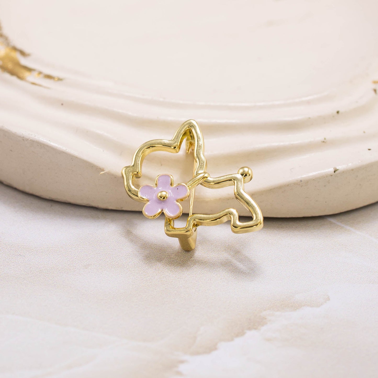 Broche perrito flor