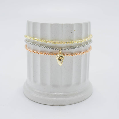 Pulsera laso tres oros
