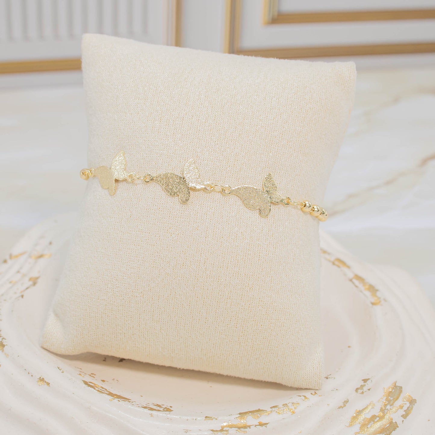 Pulsera mariposas fusco