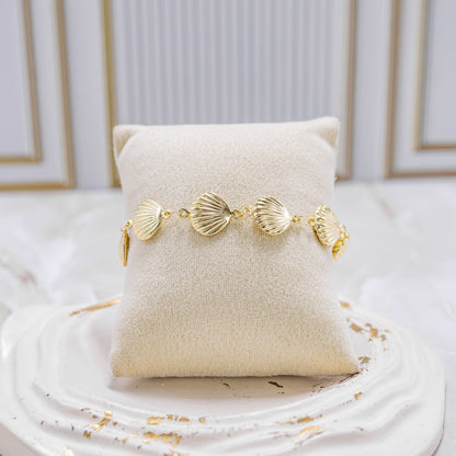 Pulsera conchas