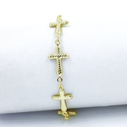 Pulsera cruces