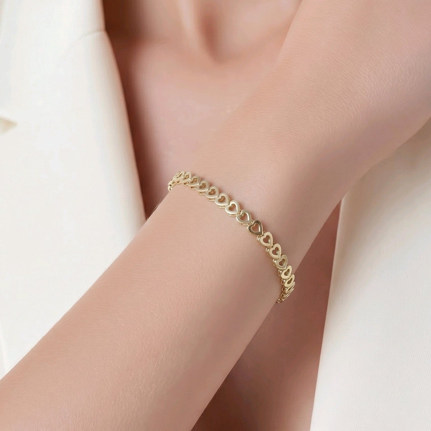 Pulsera silueta corazones