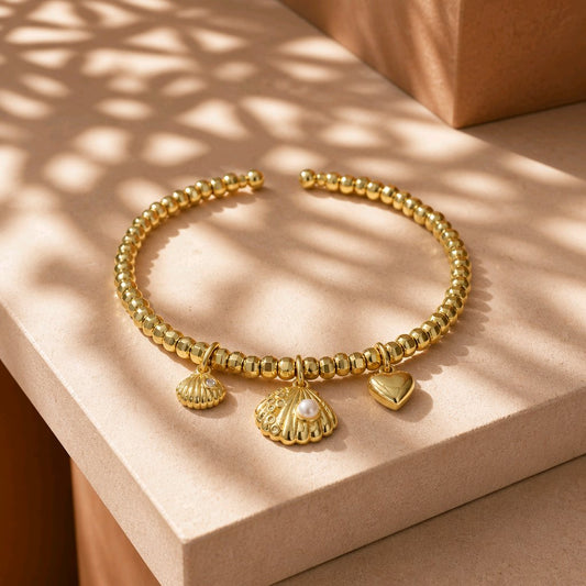 Pulsera aro conchas