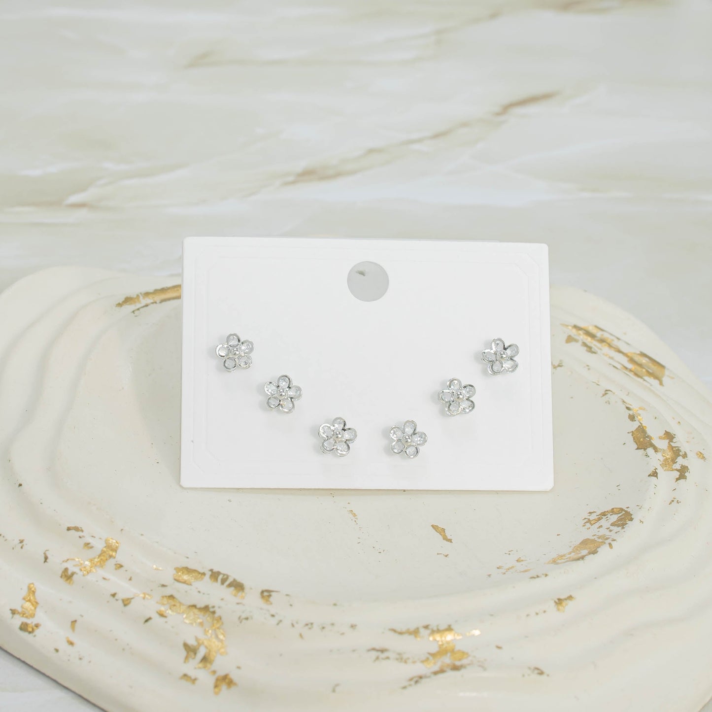 Topo trío flor zircón